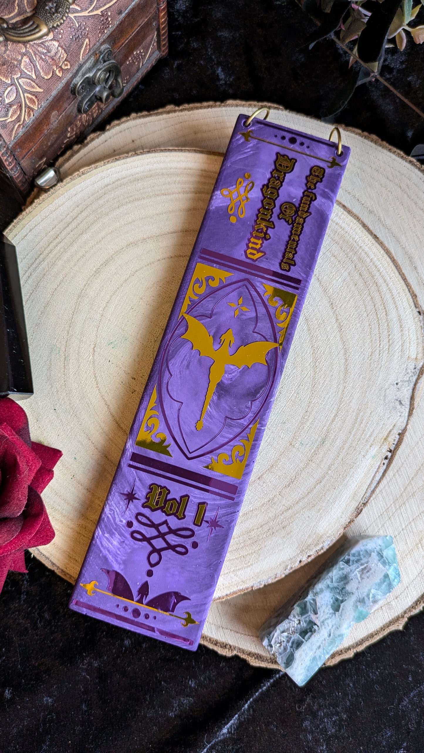 The Fundamentals of Dragonkind Book Spine Wall Hanging