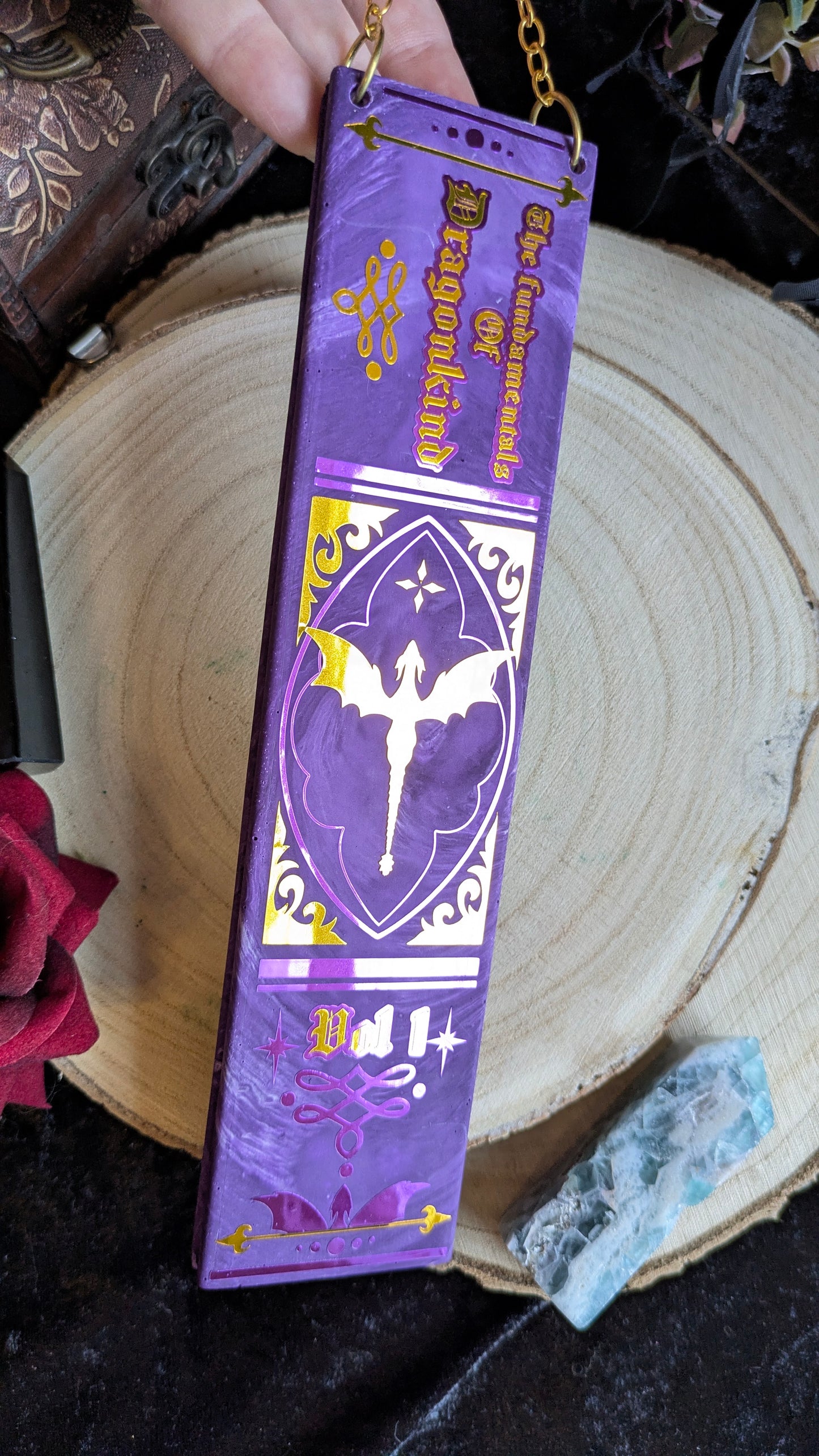 The Fundamentals of Dragonkind Book Spine Wall Hanging